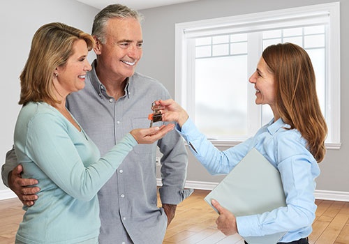 Senior Couple with Realtor Senior Couple with Realtor
