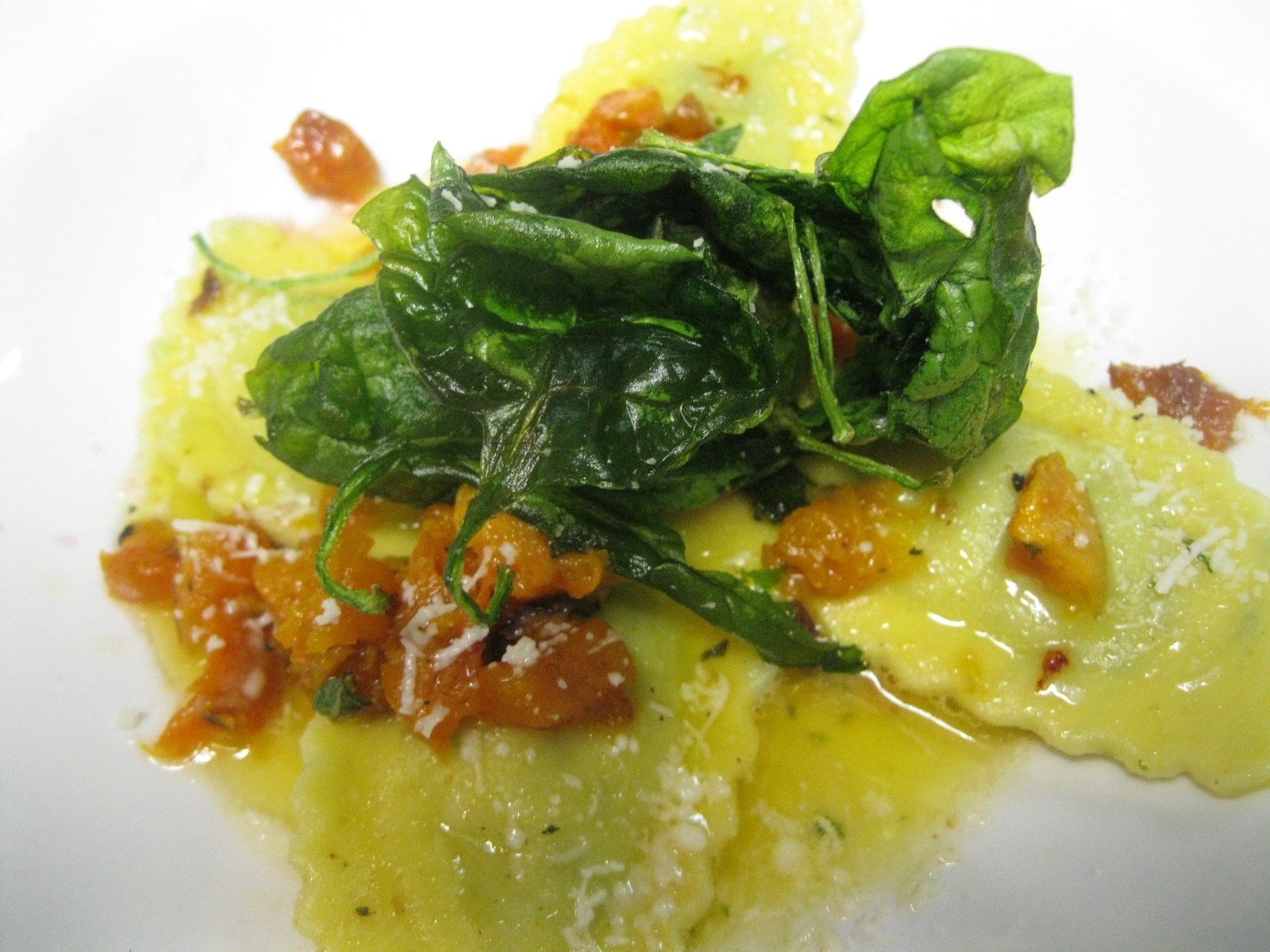 ricotta and nettle agnolotti with butternut squash and crisped baby spinach