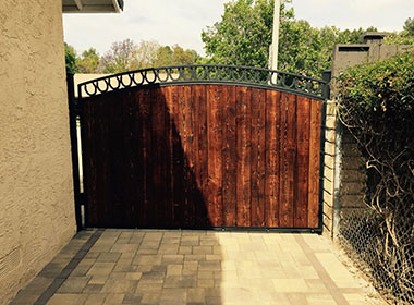 Ornamental Iron With Wood Gate