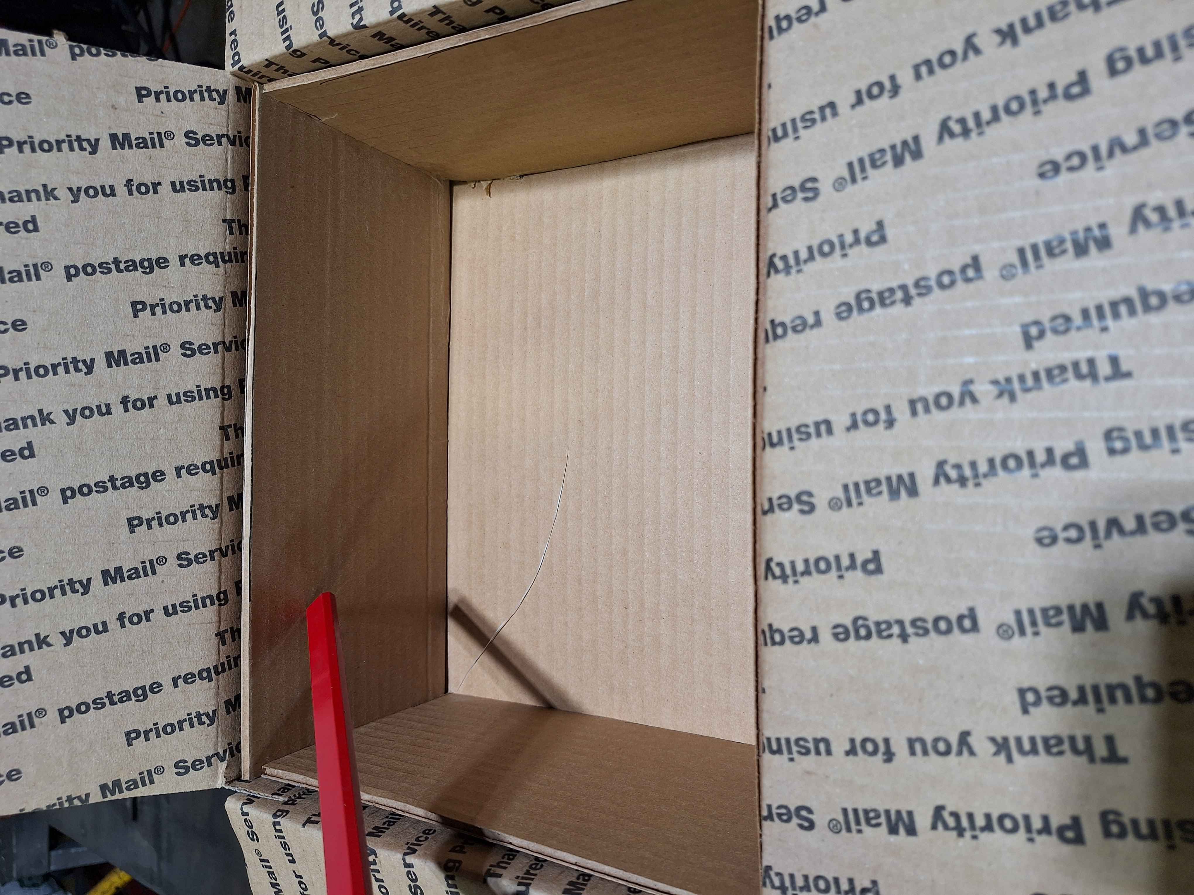 Line the box with cardboard.
