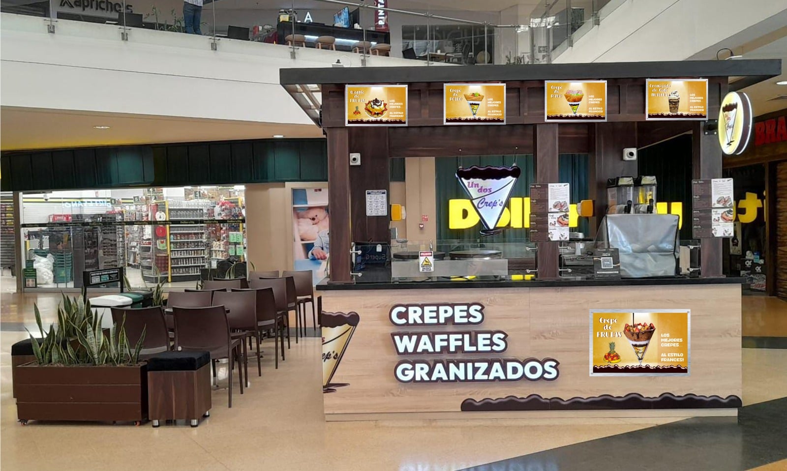 A small food kiosk in a shopping mall offering crepes, waffles, and granizados, with menu boards displaying images of the items available; seating area with chairs and potted plants. A small food kiosk in a shopping mall offering crepes, waffles, and granizados, with menu boards displaying images of the items available; seating area with chairs and potted plants.