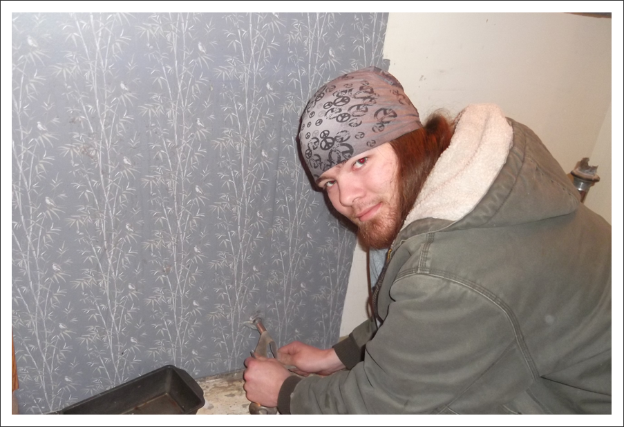 Plumber at work in bathroom||||