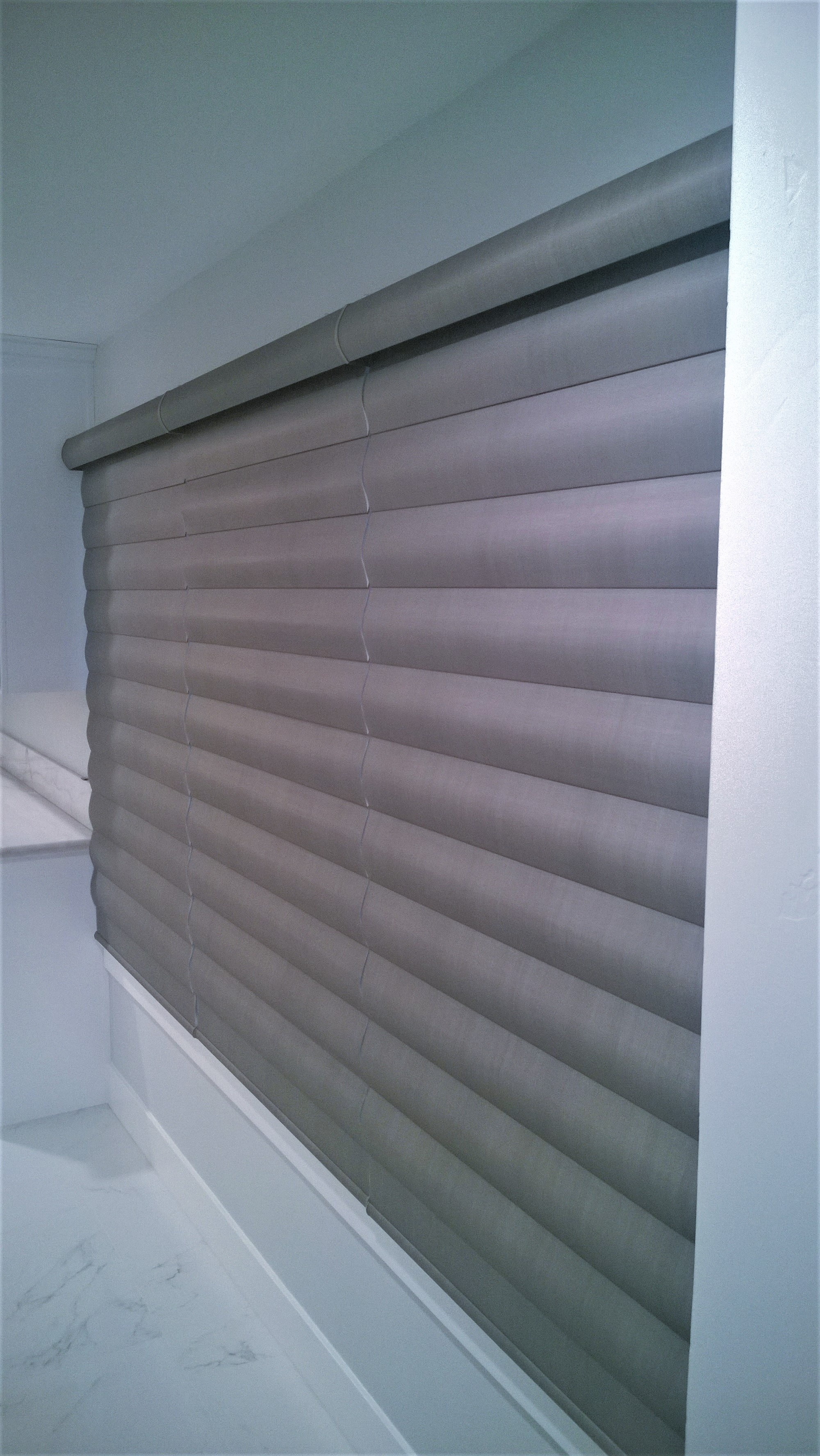 Hunter Douglas Powerview Pirouette in closed position