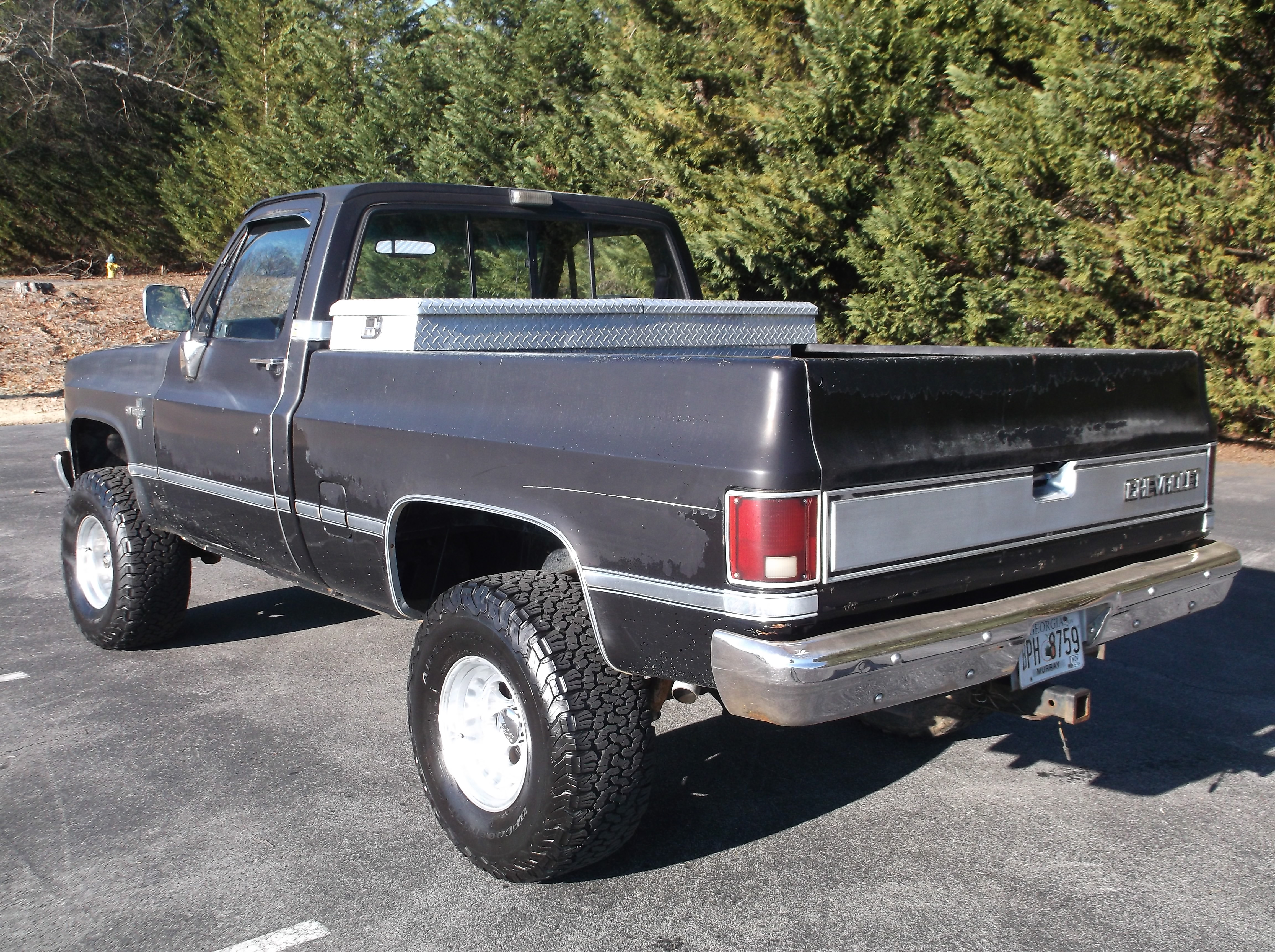 https://0201.nccdn.net/1_2/000/000/112/b67/1987ChevroletSilverado4x4Black_0003-4608x3440.jpg
