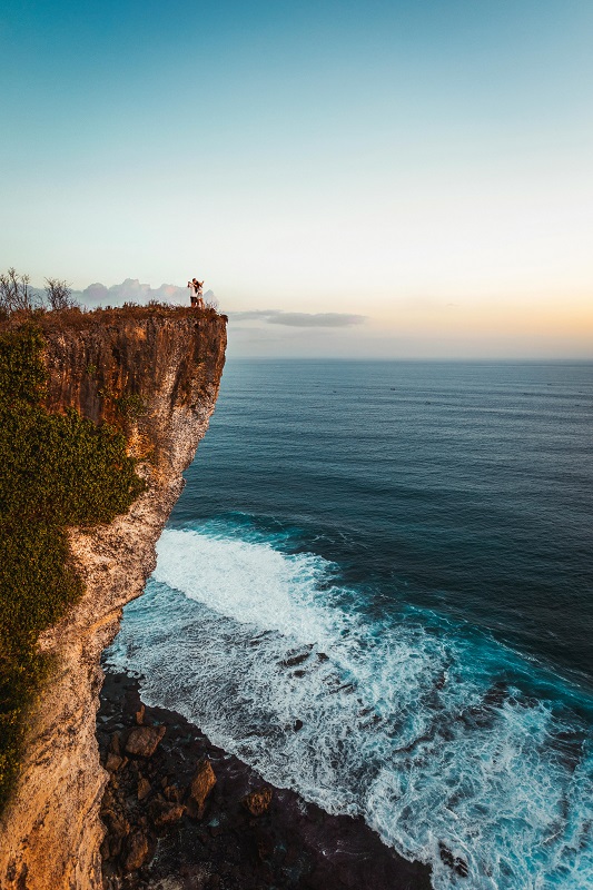 2 people Standing on cliff