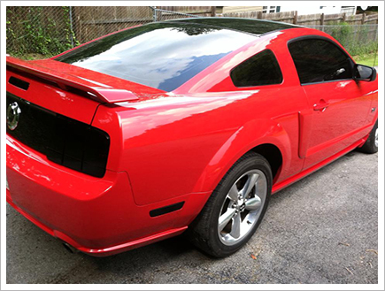 Red mustang with black windows||||