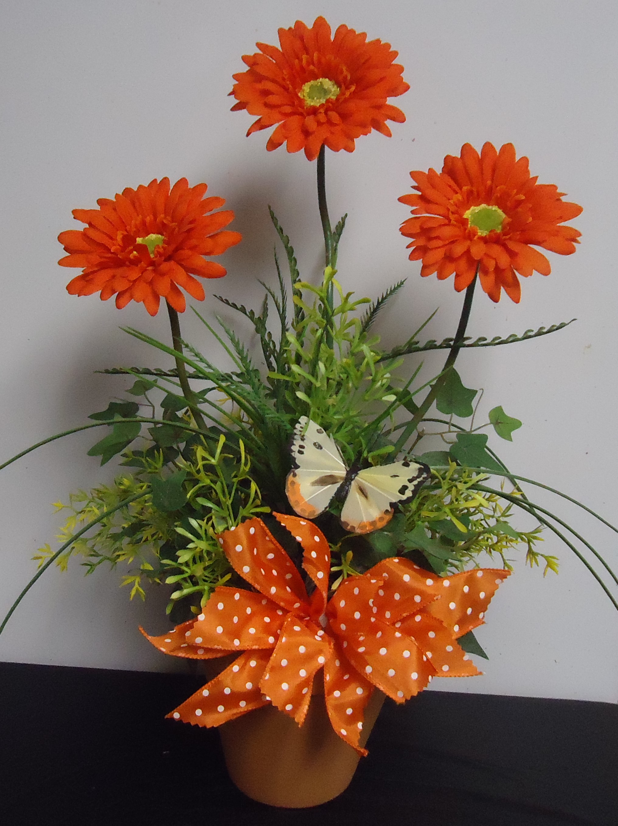 (2B) "Silk" Gerbera  Daisy Pot
(Orange W/ Butterfly
$32.50