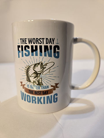 15oz ceramic mug featuring a worst day fishing design