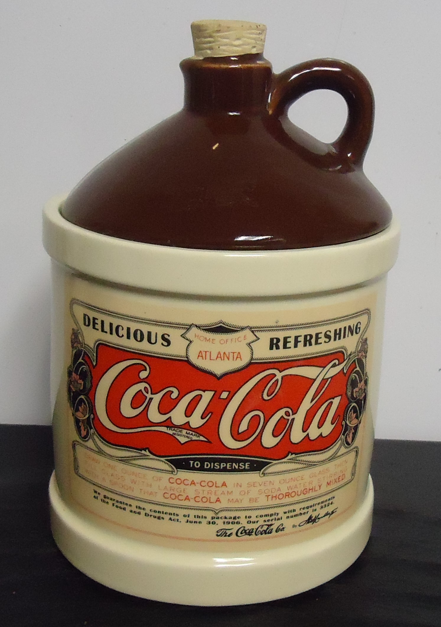 (1A)  "Coca-Cola Jug 
"McCoy" Cookie Jar
$60.00