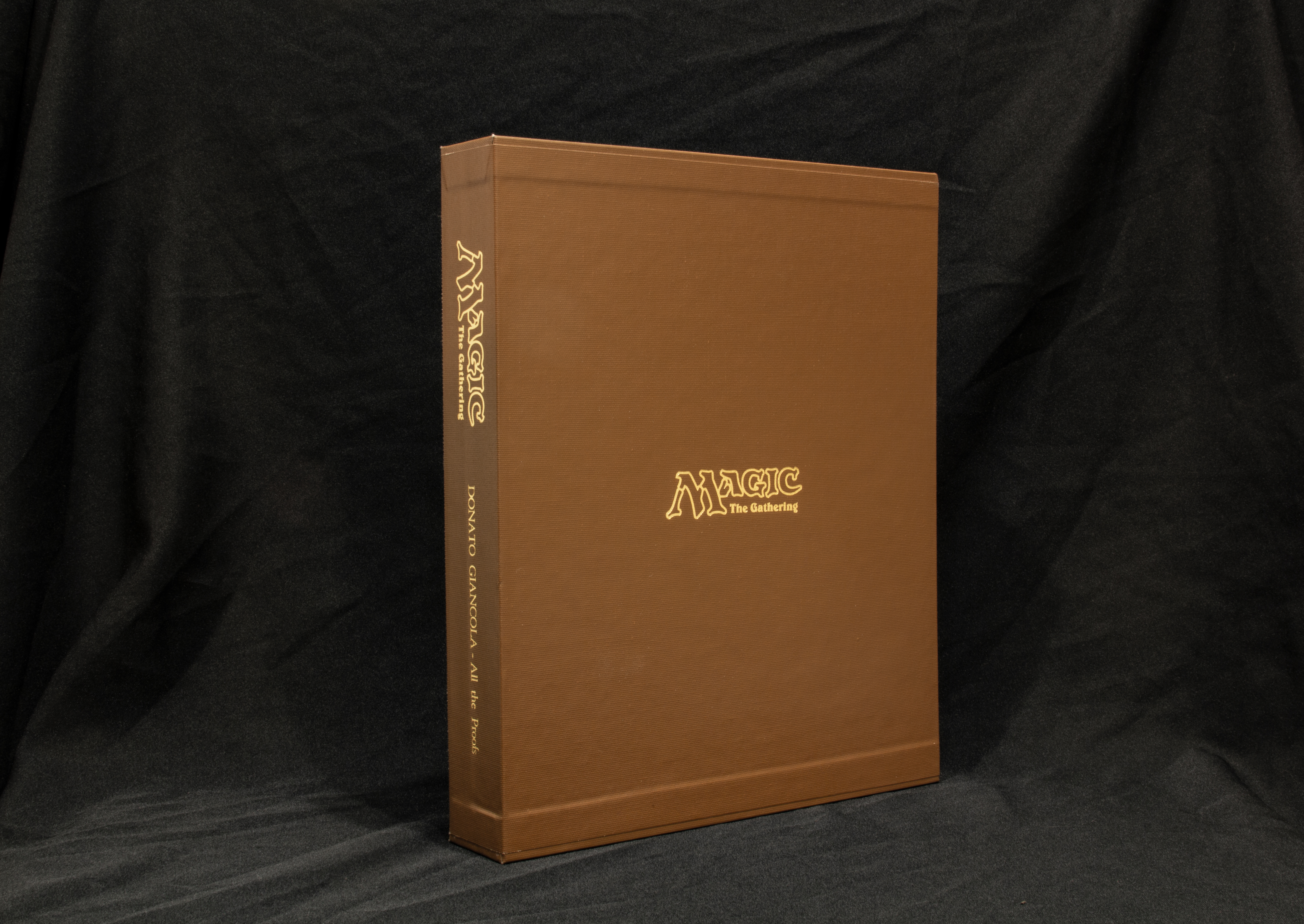 Archival and professionally embossed slipcase
cover for protection of the leather binder and proofs
Tan only