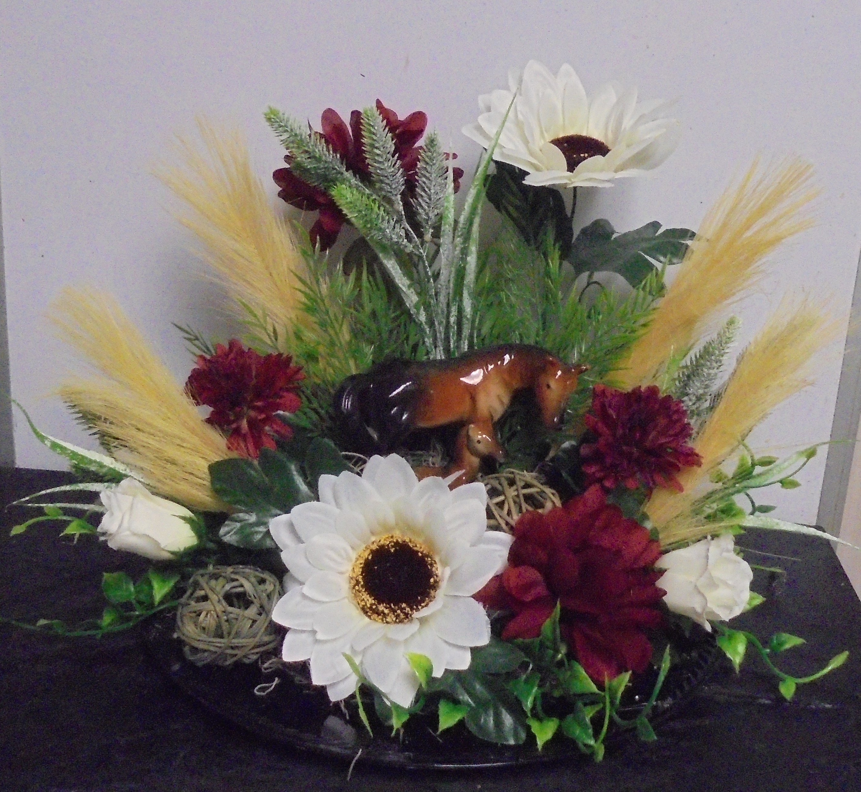 (37) "Silk" Horse Arrangement
$50.00