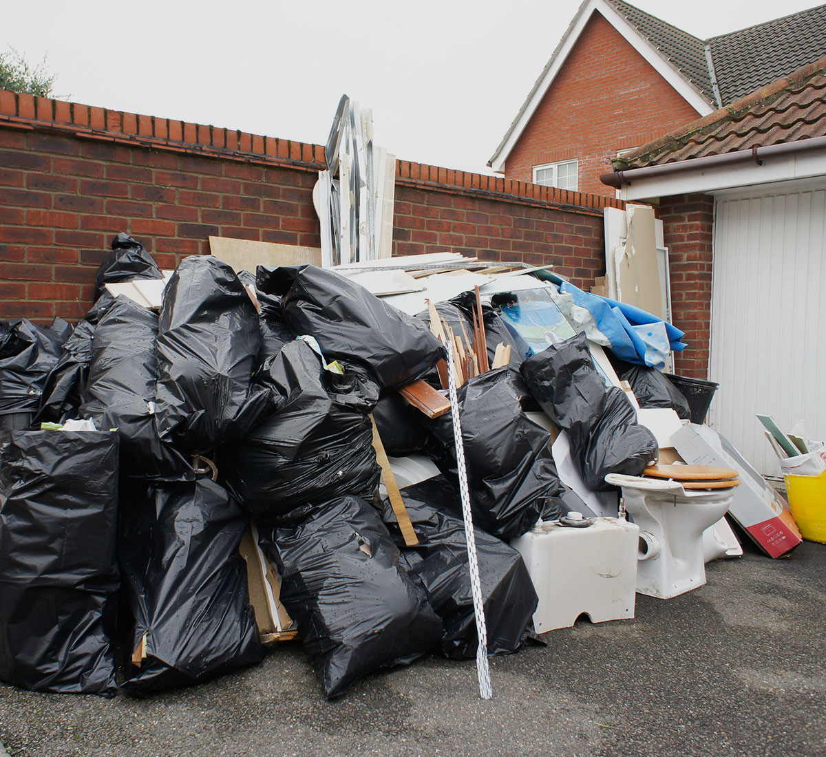 Garbage in Front of House