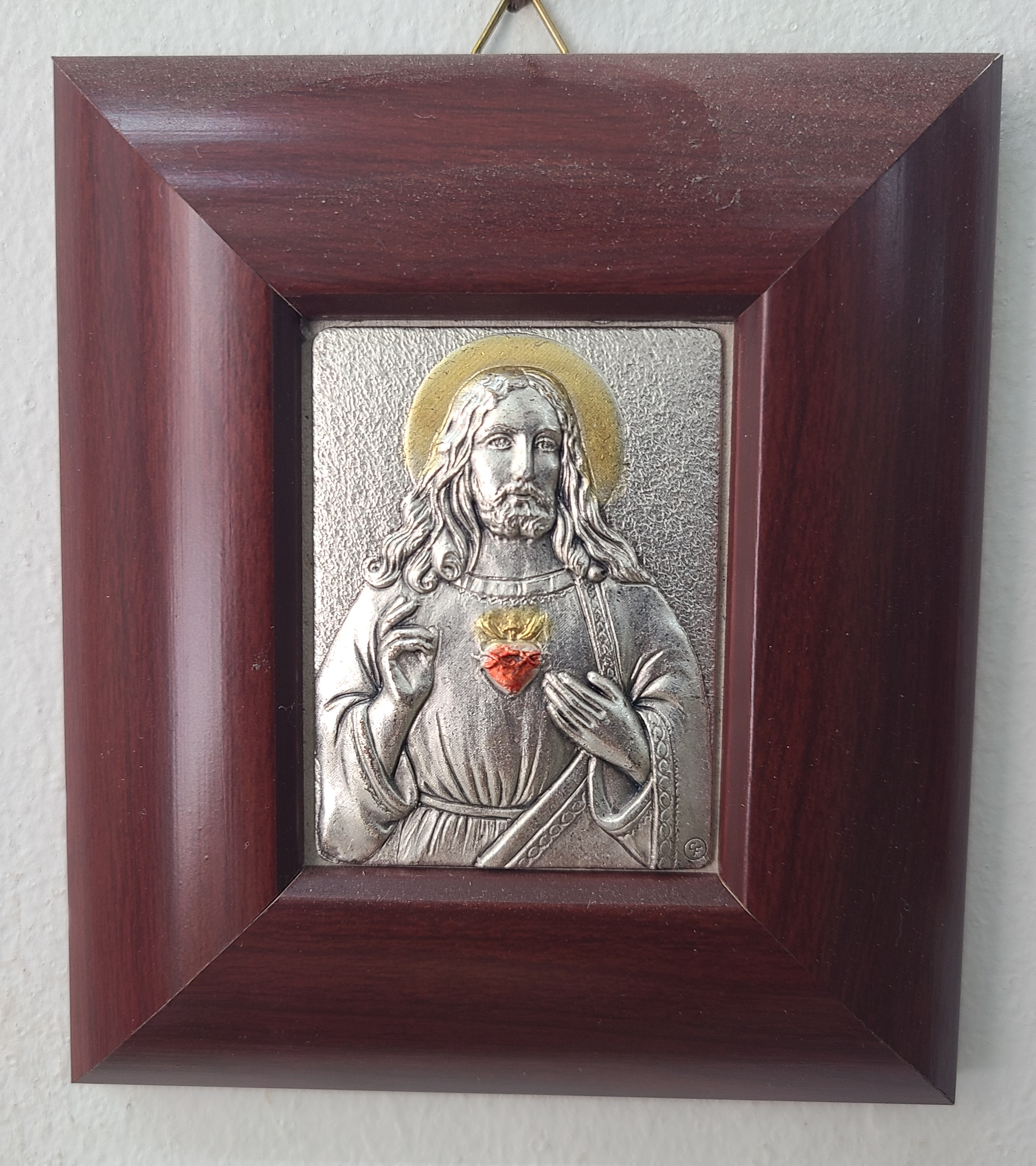 SAGRADO CORAZON DE JESUS LAMINADO DE PLATA
marco de madera 10cm x 10cm