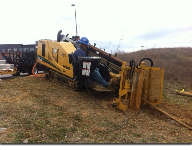 Worker driving vermeer||||