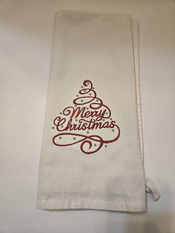 Flower sack towel featuring a Merry Christmas design