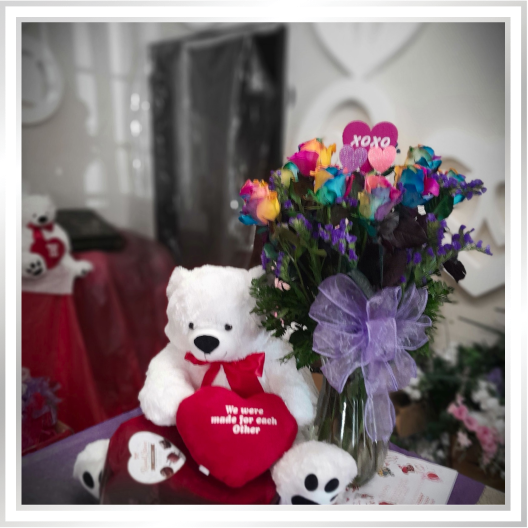 Bouquet of flowers with a white teddy bear Bouquet of flowers with a white teddy bear