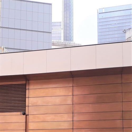 Metal coating projects. Bronze patination on cladding for Crossrail Liverpool Street Station.