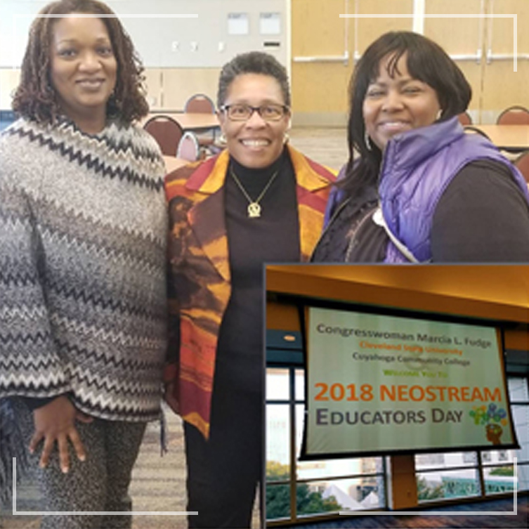 Three women smiling at the camera