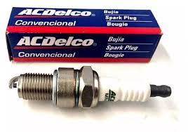 Automotive technician performing an oil check