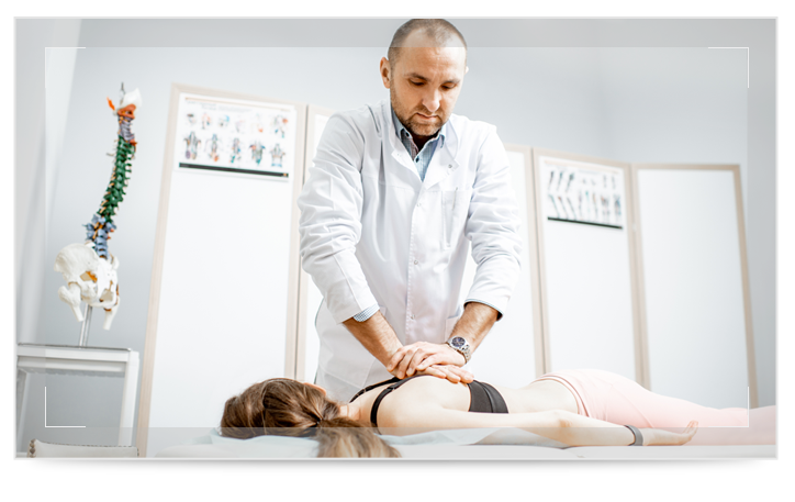 A doctor working on a patient