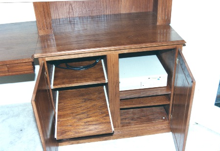 Right side of this unit houses slide out shelves and adjustable
 shelves for computer, printer, scanners, etc.