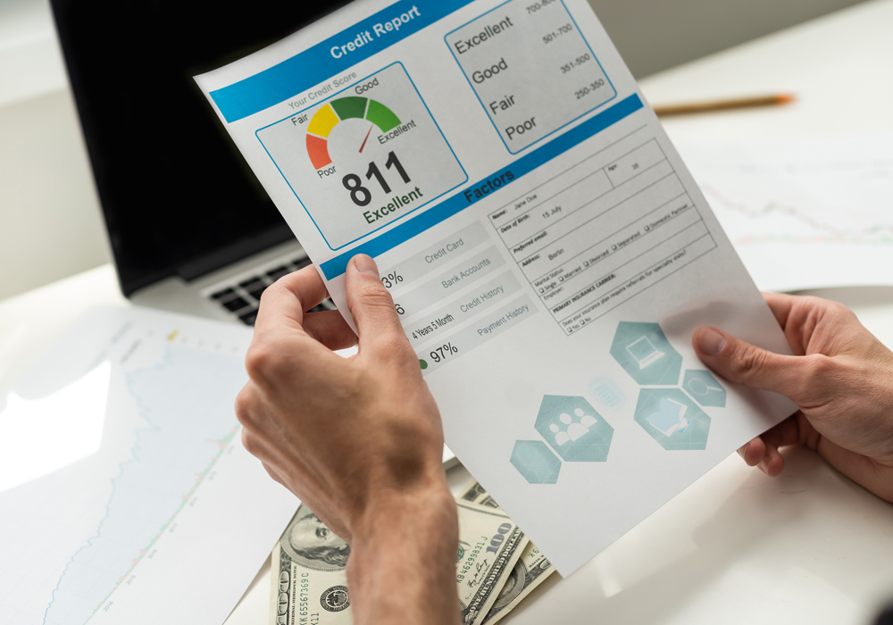 Someone holding a credit report Someone holding a credit report