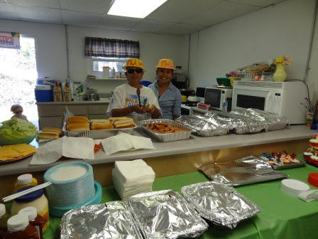 Faithful workers preparing the food....Kids are you hungry yet?