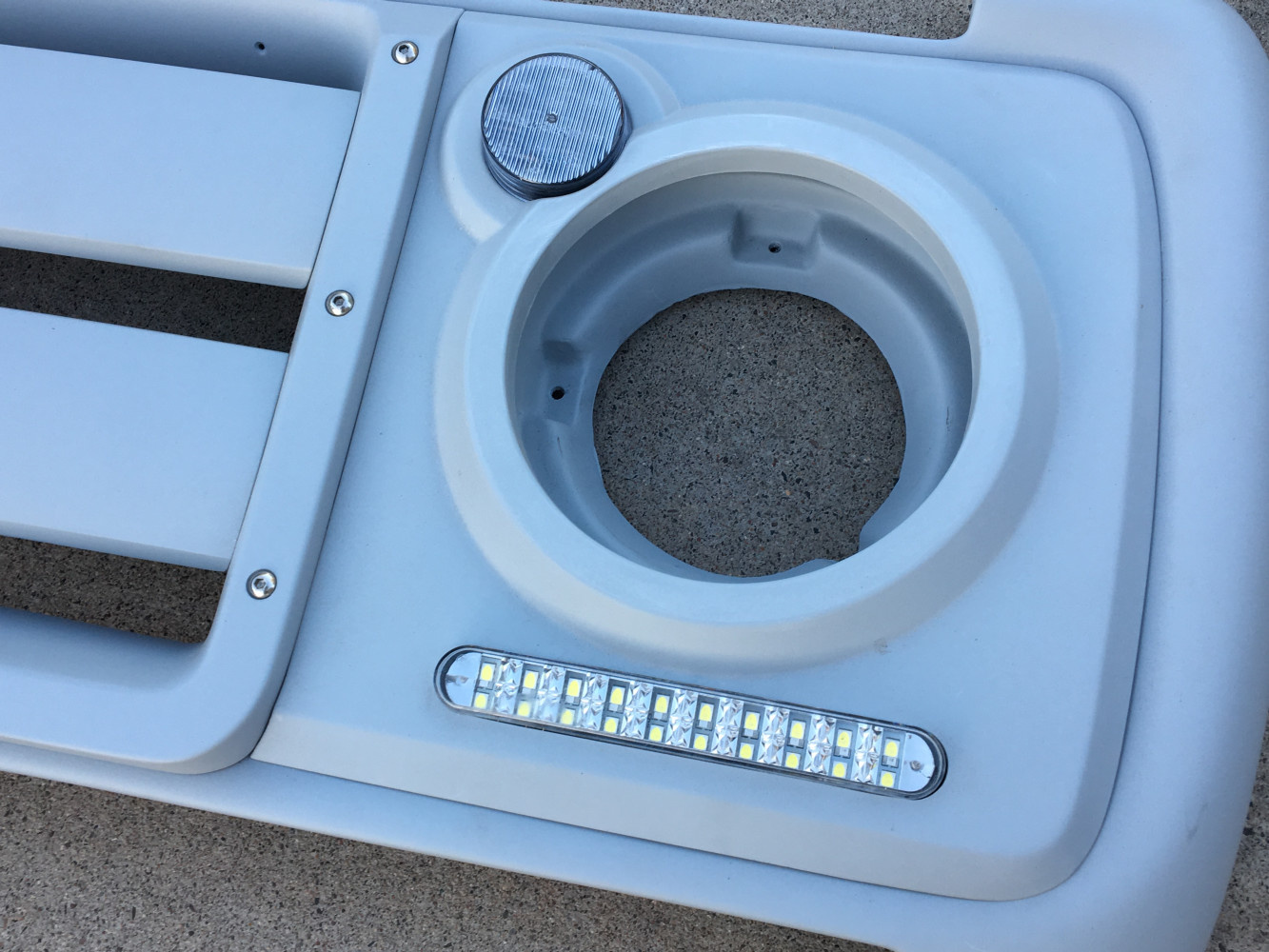 Plain center grill with headlight cover: Clear or amber puck light and lower light bar included.