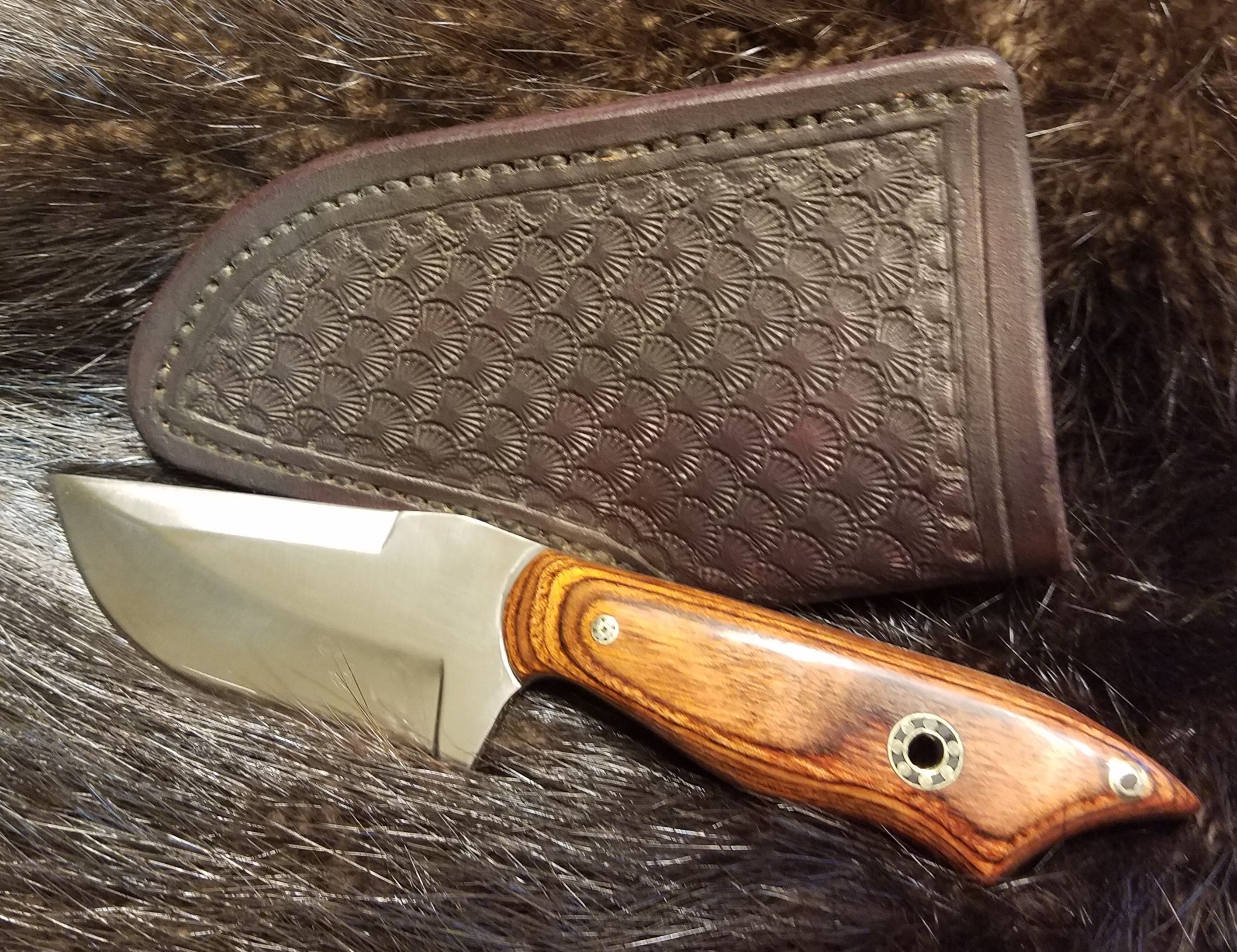 Skinner, with Cocobolo Dymondwood handle, Hand tooled, hand stitched Leather Sheath,   $185.00