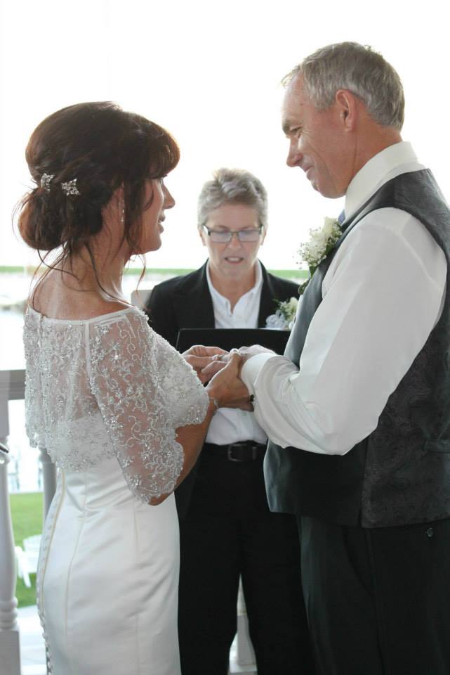 Cory and Dean say their vows at The Waters in Oshkosh in 2013.
