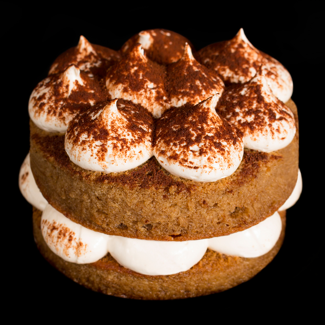 Tiramisú
Pan nube japonesa, envinado con amaretto y crema de queso