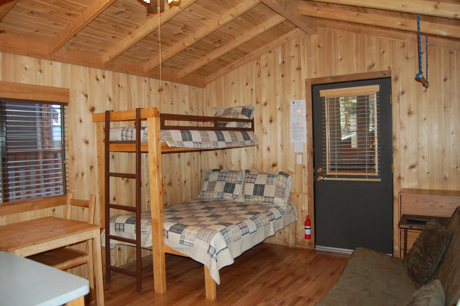 Inside view of studio cabin
with full bed & bunk beds