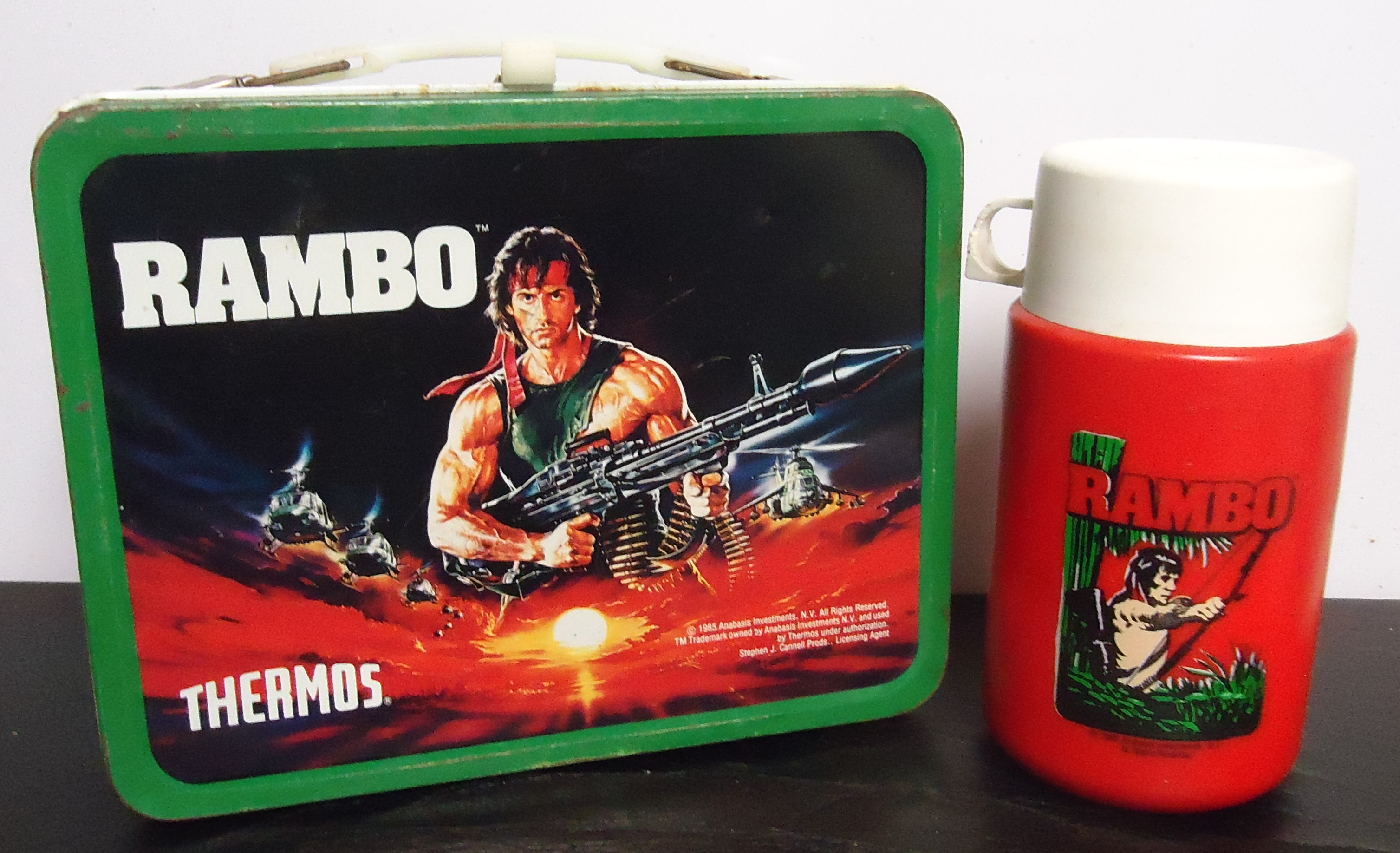 (2B) "Rambo" Metal Lunch Box
W/ Thermos
$55.00