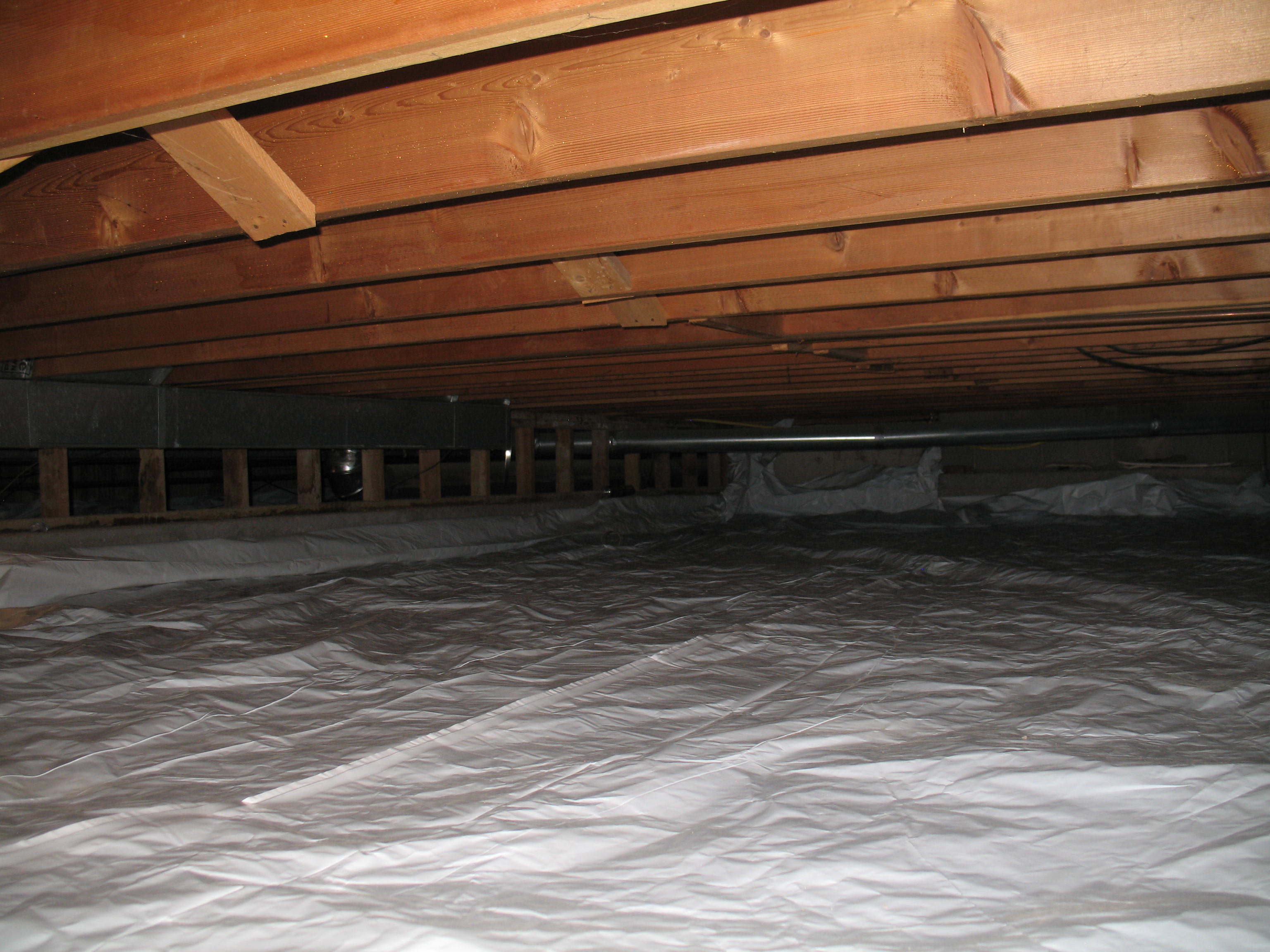 Crawlspace sealed with gas impermeable cross-laminated  poly./EPA reg.