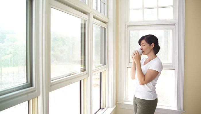 Woman Looking Out the Window.