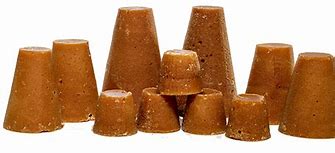 Elderly couple driving a convertible car