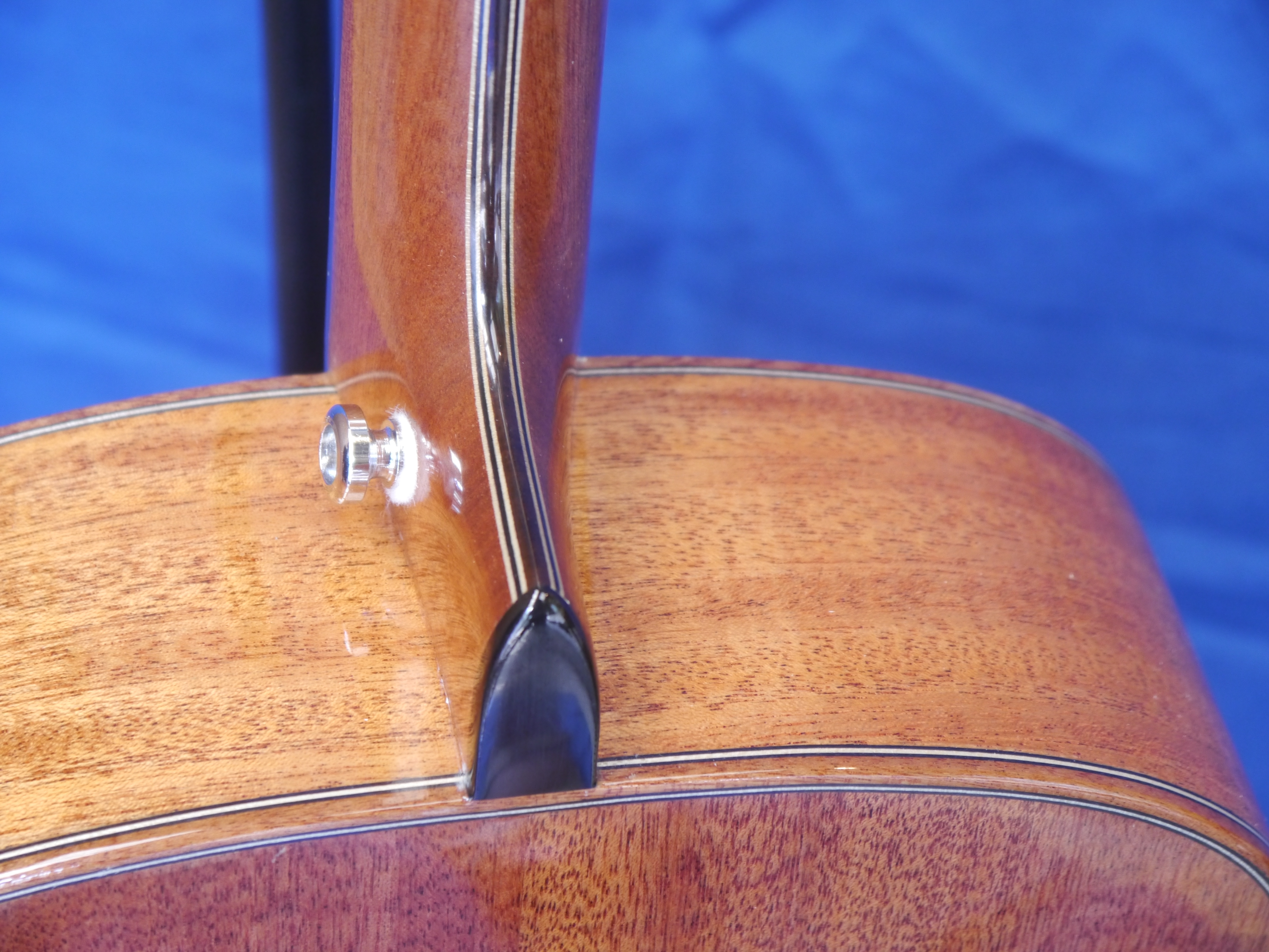 Mahogany Instrument with laminated neck.
We always laminate instrument necks for strength but sometimes get carried away with decorative sections