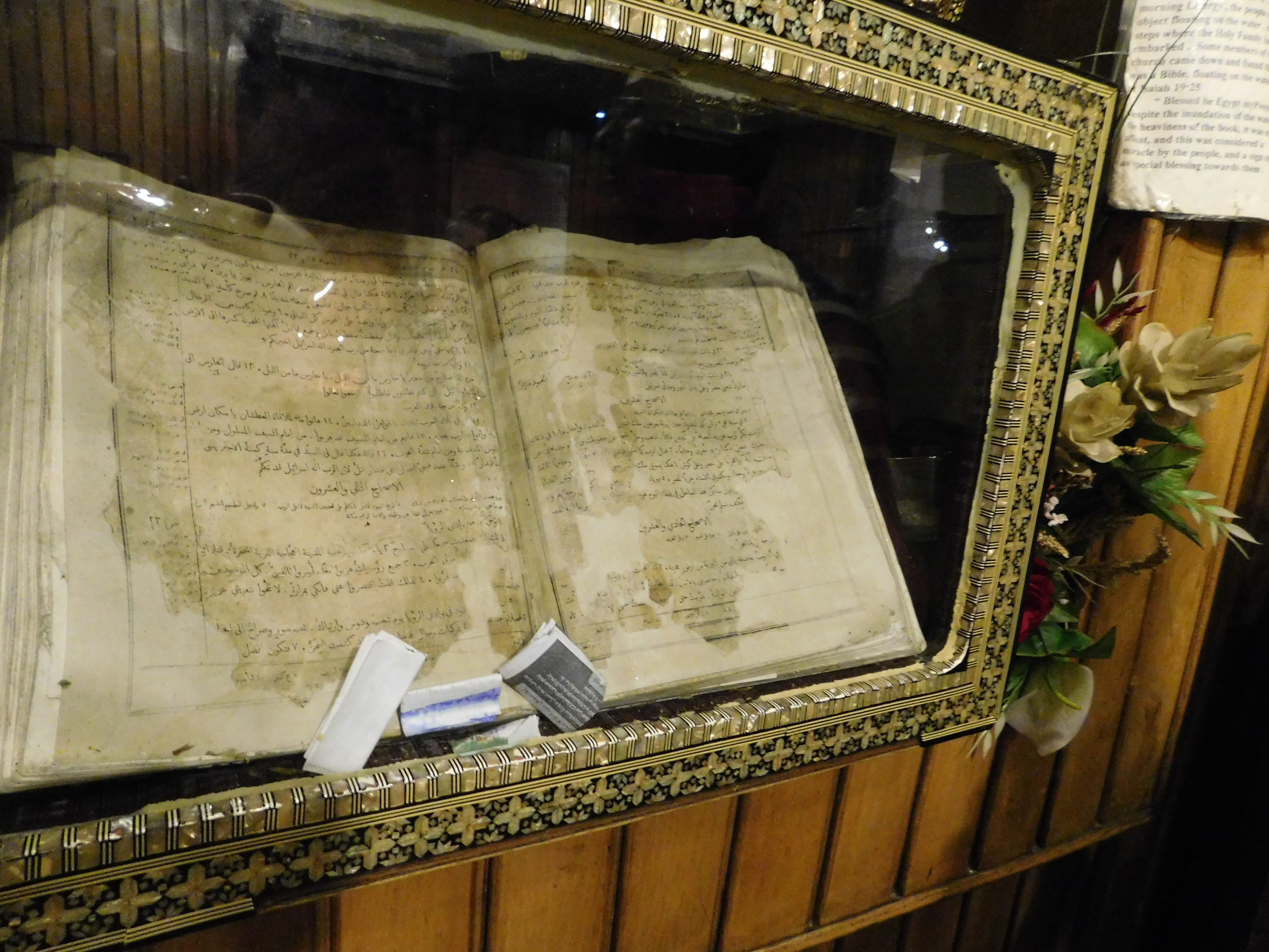 FLOATING BIBLE displayed
at St. Mary Church open to 
page that says I Love Egype my people
