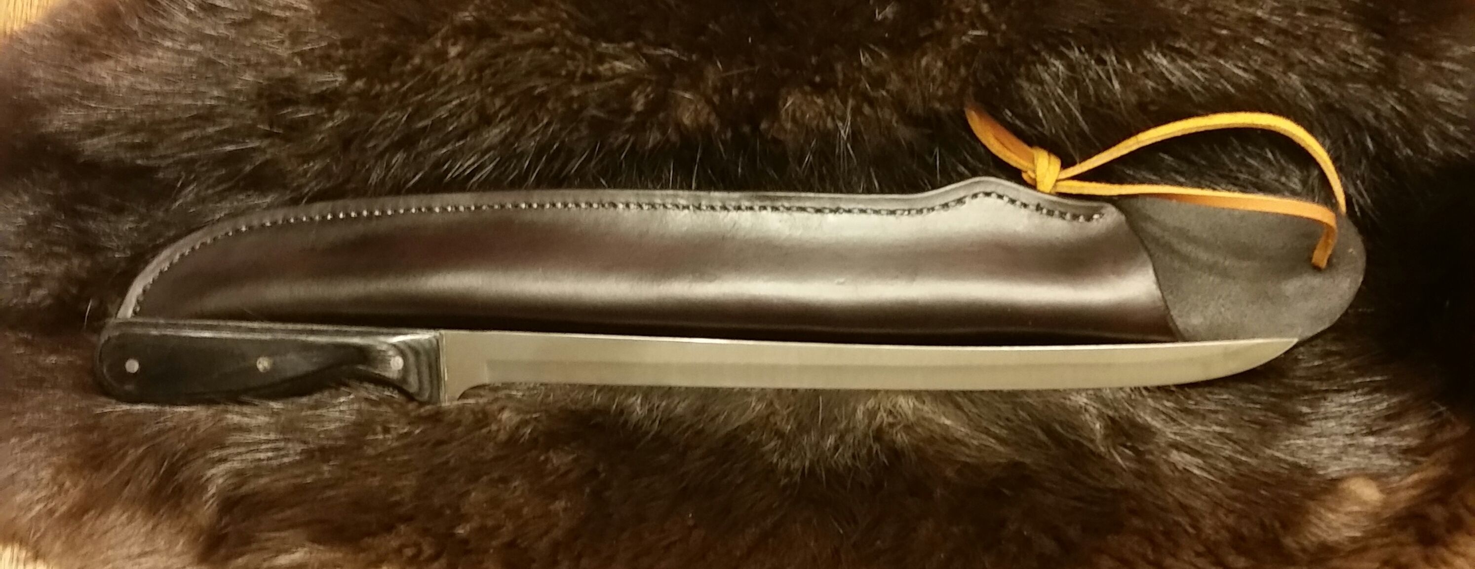 Long Filet Knife with Hand Stitched Leather Sheath...  $130.00