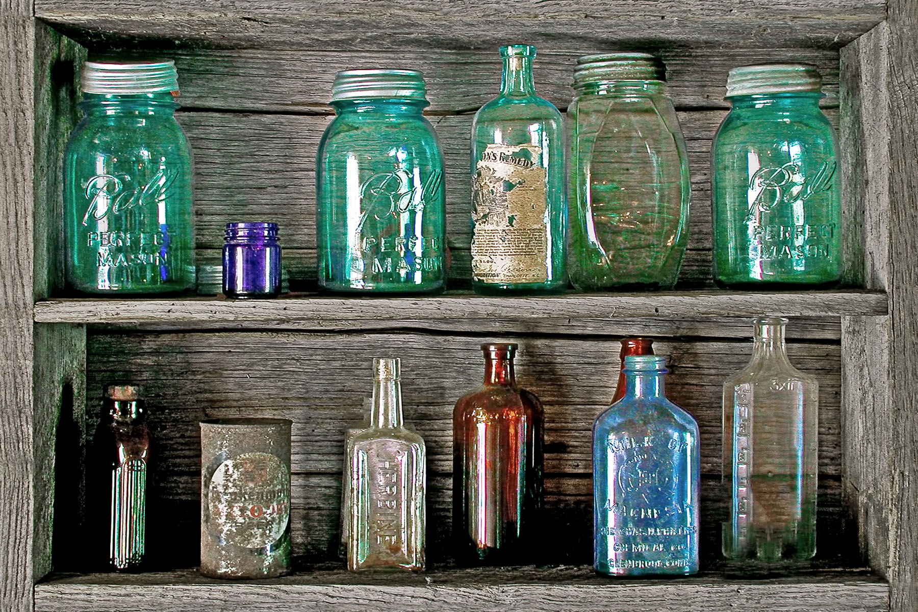 OLD JARS - These old jars were in a little museum in central Kentucky. I also photgraphed an old rocking chair in that same museum. You just never know.