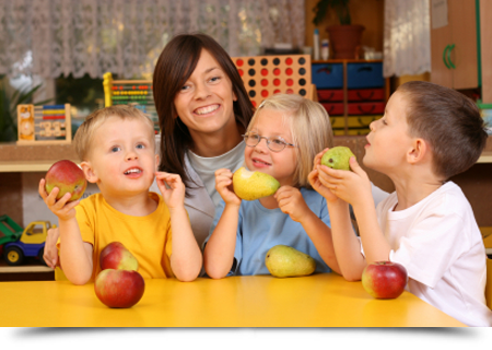 Preschoolers having break for fruits||||