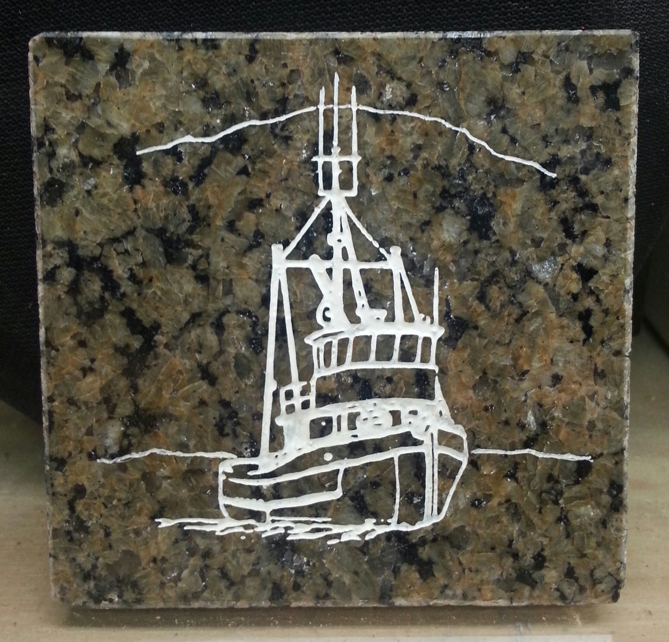 Hand engraved Seine boat on a 4x4 granite coffee coaster... not a cheap laser imitation... $25.00