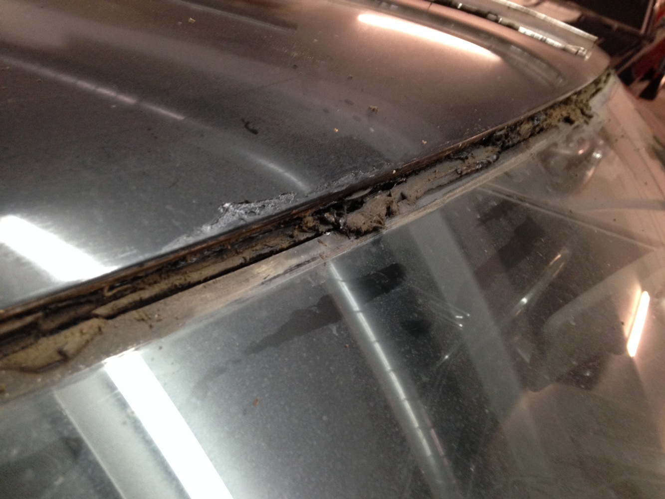 Molding removed. 40 year old windshield sealant
like tar! Thank FORD for doing this otherwise
there would be leaks!