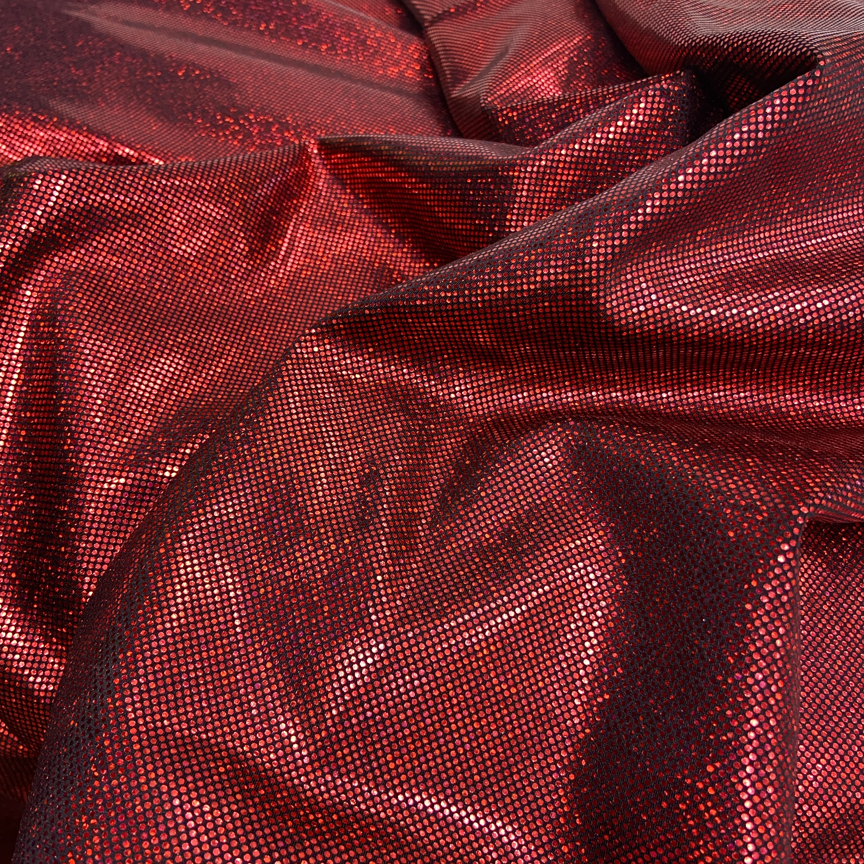 Red sparkle hologram on black 