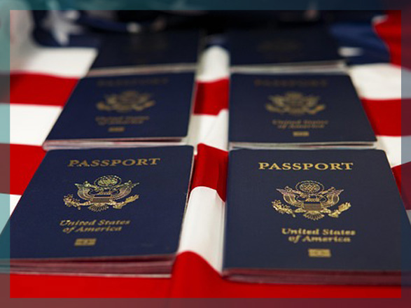 The passports laying on an American flag