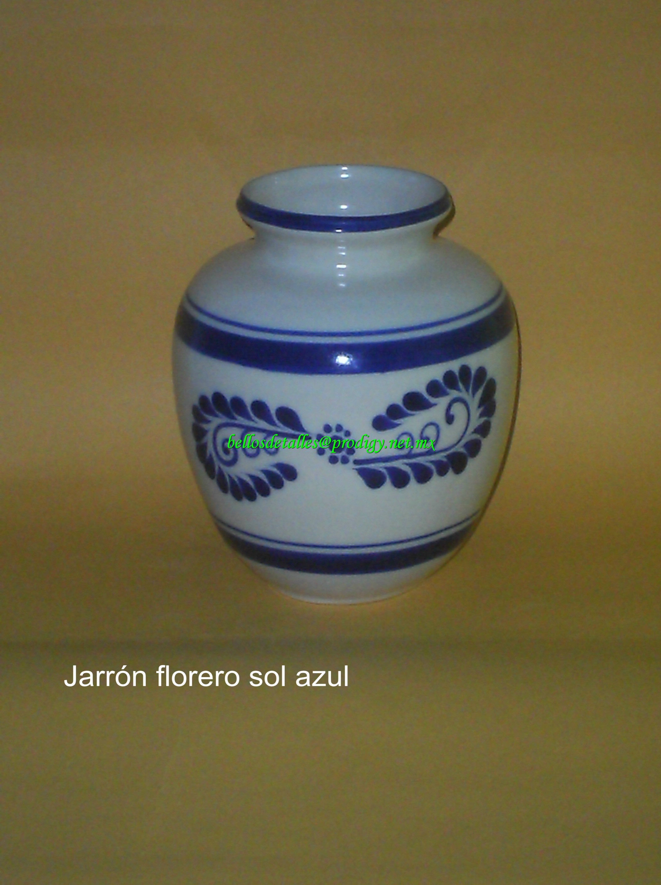 https://0201.nccdn.net/1_2/000/000/12c/109/Jarr--n-florero-sol-azul.jpg