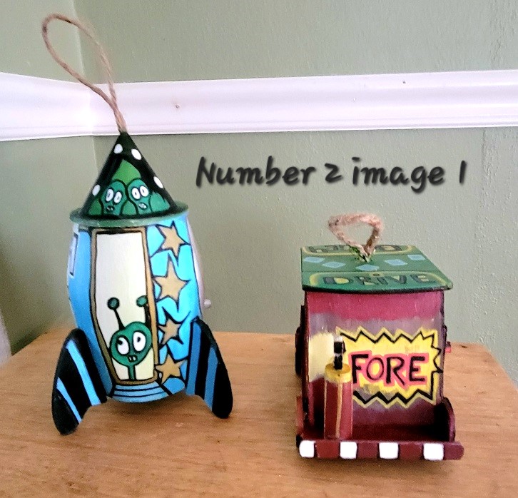NUMBER 2 IMAGE 1 THROUGH 5, 2 BIRD CAGES. The cost of the spaceship is $42.00. The Golf cart 
is $48.00