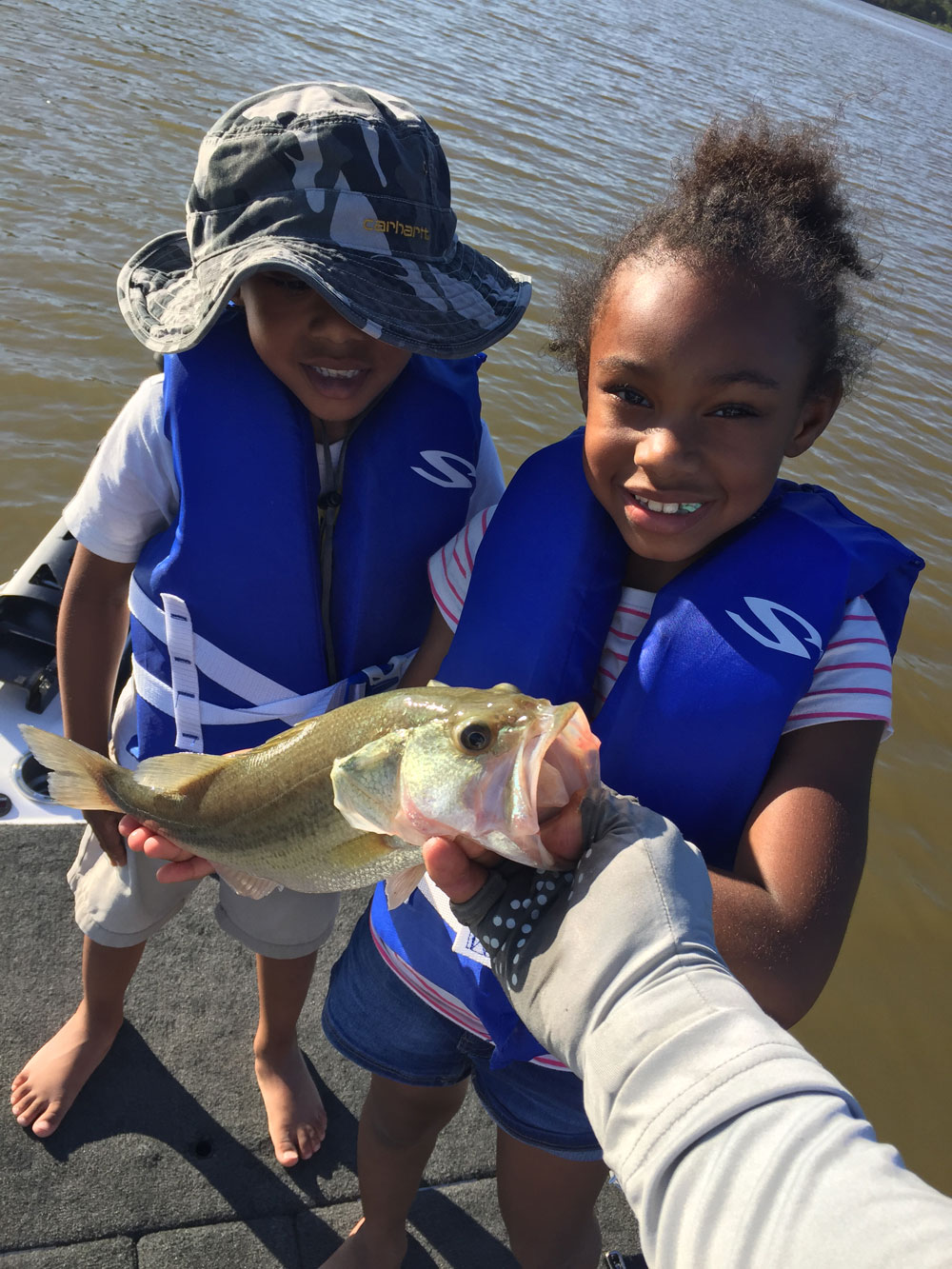 Kids Holding A Big Fish