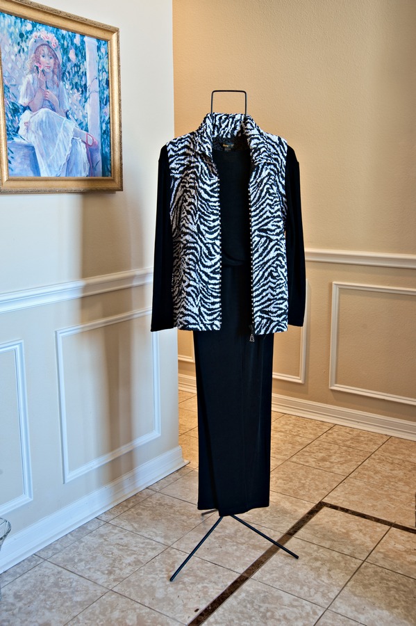 Zebra Vest, Black Top and Pants||||