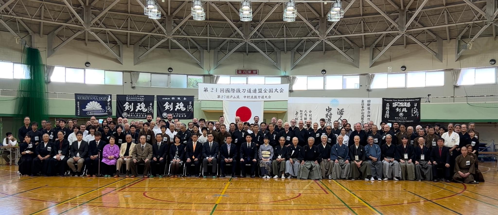 Taikai group photo with honored guests, judges and competitors.